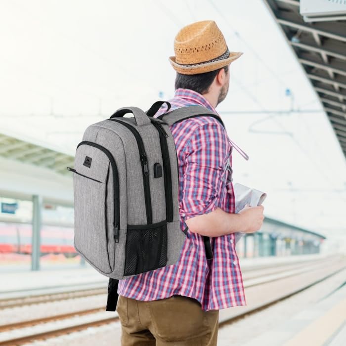 Mochila de viaje para portátil, delgada, resistente y antirrobo, con puerto de carga USB, resistente al agua, ideal para la universidad, la escuela, para hombres y mujeres, compatible con portátiles de 15,6 pulgadas, color gris