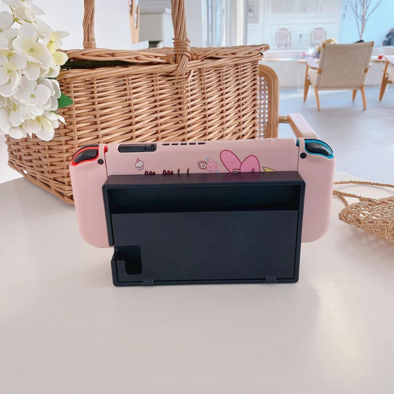 La melodía es adecuada para la cubierta anticaída de color suave de silicona Nintendo OLED, funda protectora desmontable para consola de juegos portátil NS